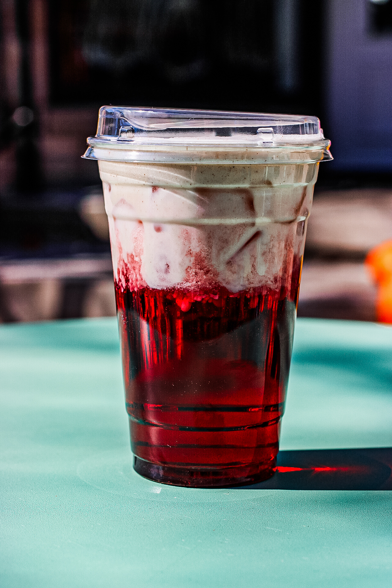 Berry lotus drink with cream cold foam